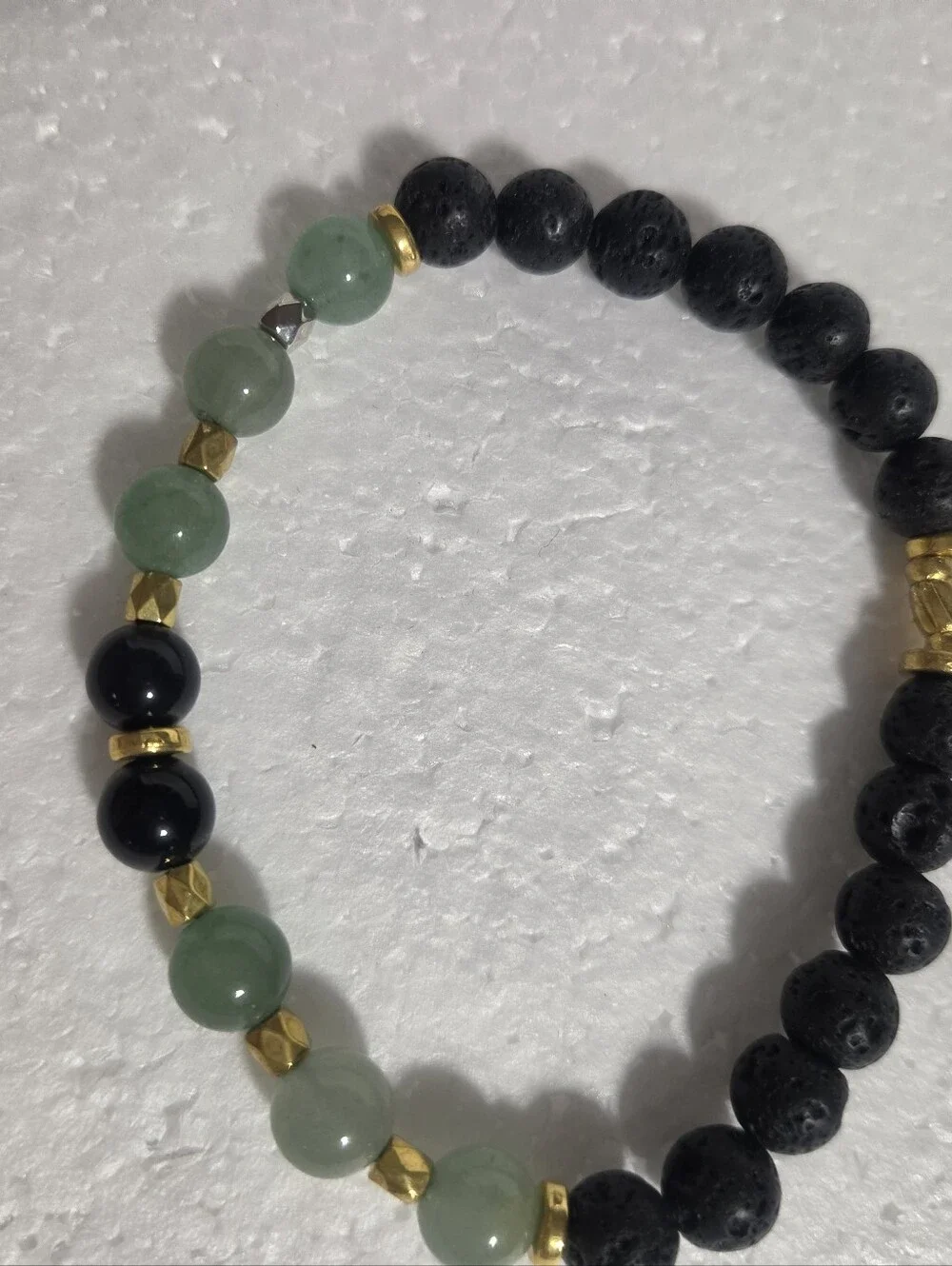 Handcrafted Green & Black Beaded Stretch Bracelet with Gold Accents